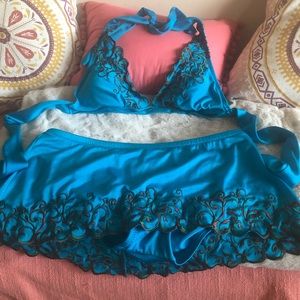 2 piece bathing suit, practically new! Cute trim.